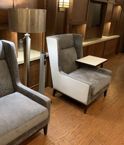 Gray MG Power Plus shown in a lobby space between two chairs
