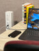MG Power Plus - White - Charging Phone and Laptop on Desk